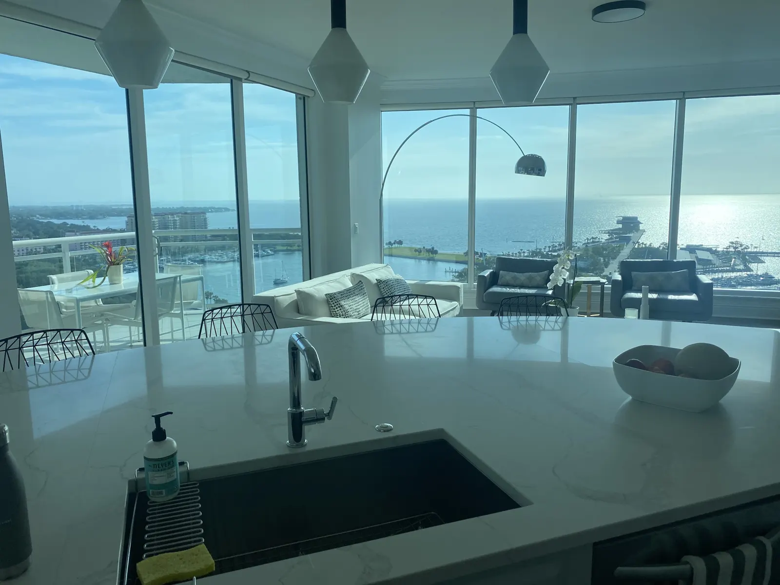 Kitchen with pendant lights over the counter and bay views, from the Manny Source Electric Google profile